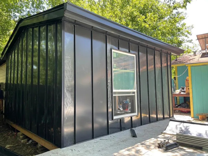 Black standing seam metal wall panels for Roof Inspection in Poplar Bluff